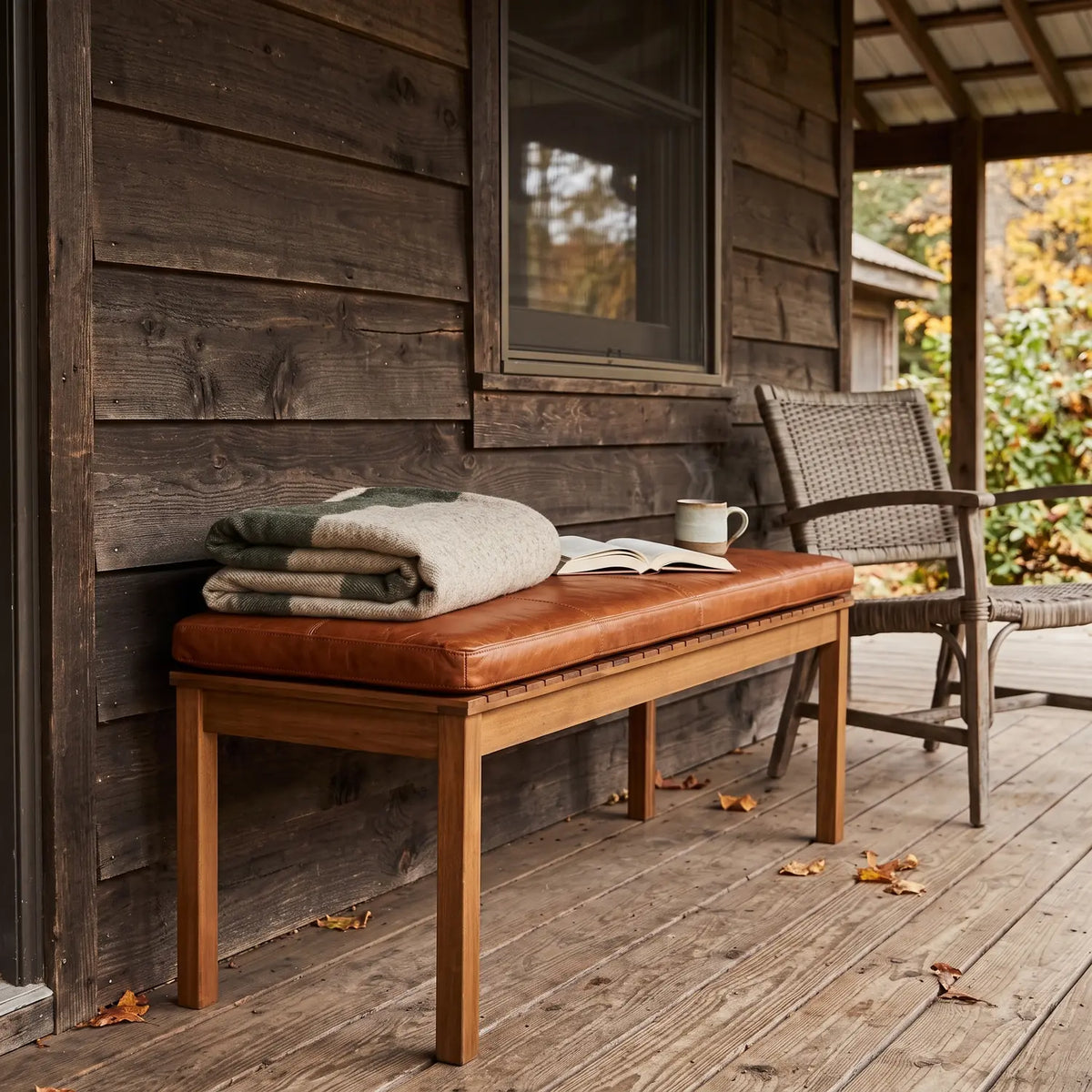 Buffalo Leather Bench Cushion 118 cm on a bench of the same size on a cabin porch